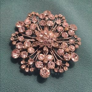 Large rhinestone flower brooch.